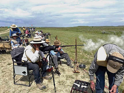 Allen Cunniff fires at the second rectangle with Scott Sibley spotting his shots.